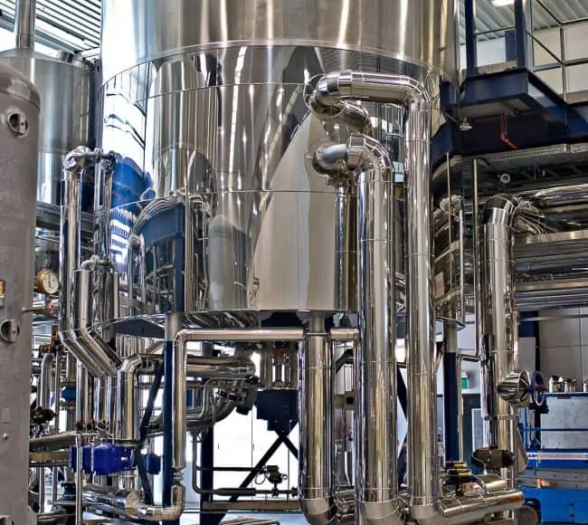 Large tank with pipes coming out of it